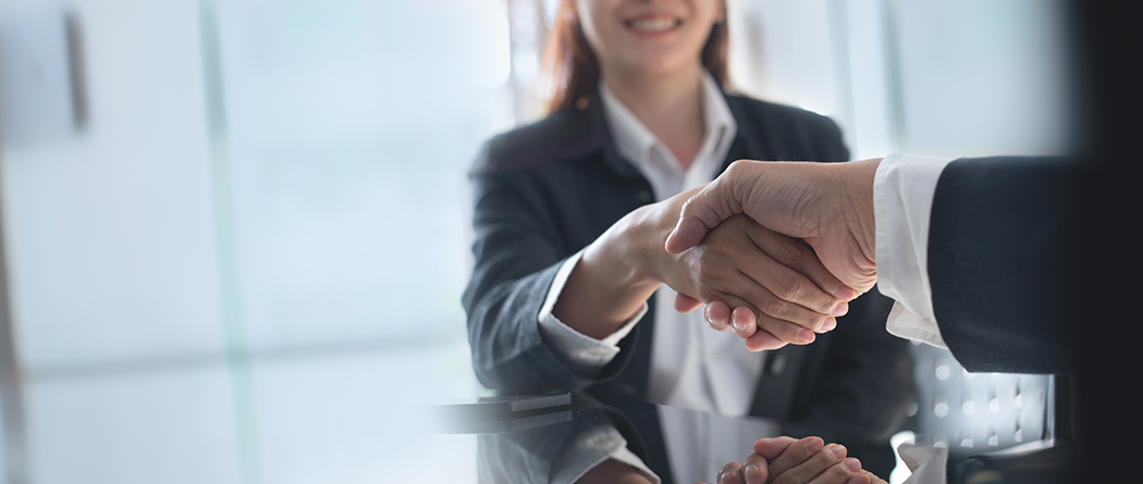 Employee receives welcome or congratulatory handshake