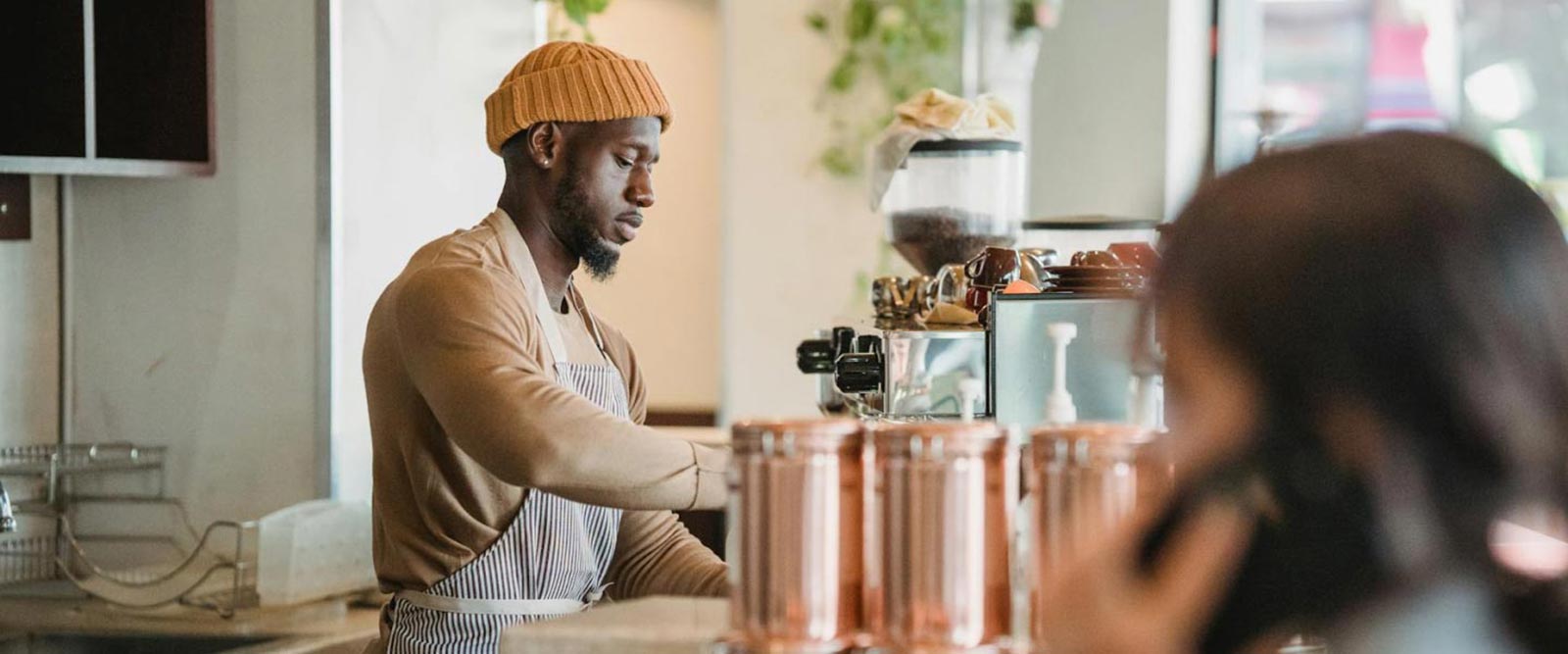 A man working in a local coffee shop