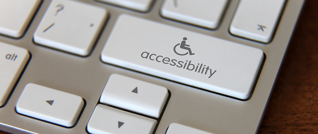 Up-close image of an accessibility key on a keyboard