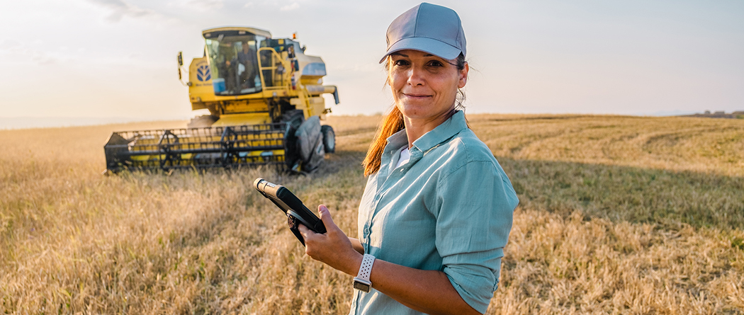 Ag manager tracking progress of combine during harvest